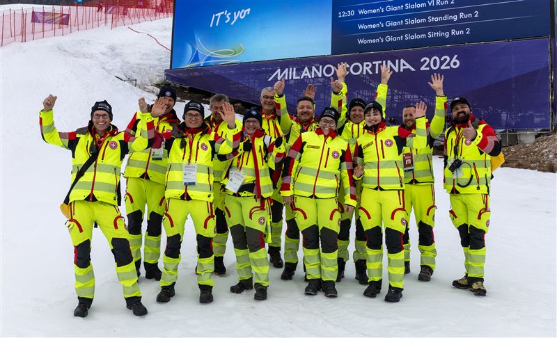 Einige Sanitäter des Weißen Kreuzes im Einsatz bei den Olympischen Winterspielen Milano Cortina 2026